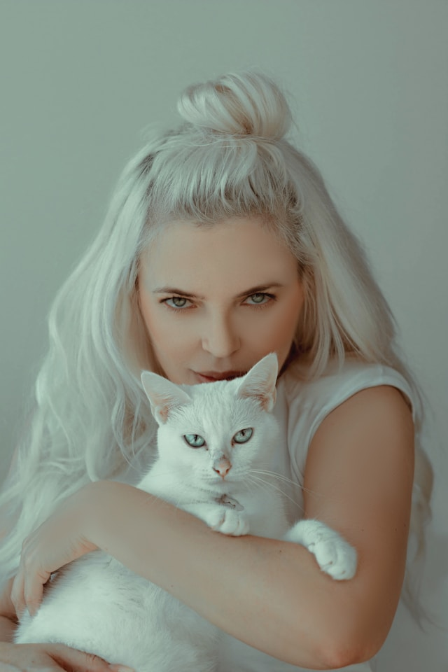 person holding a cat